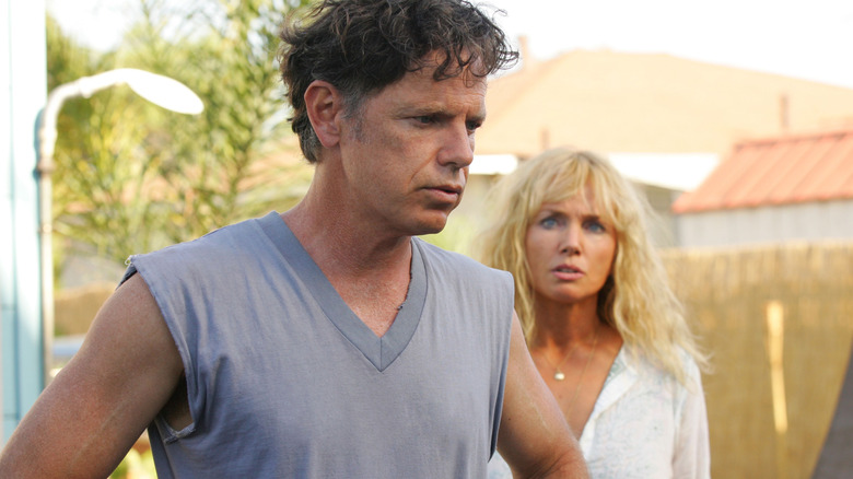 Bruce Greenwood as Mitch and Rebecca De Mornay as Cissy looking concerned on John from Cincinnati