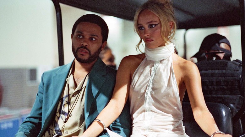 Abel Tesfaye and Lily-Rose Depp as Tedros and Jocelyn riding on the Idol