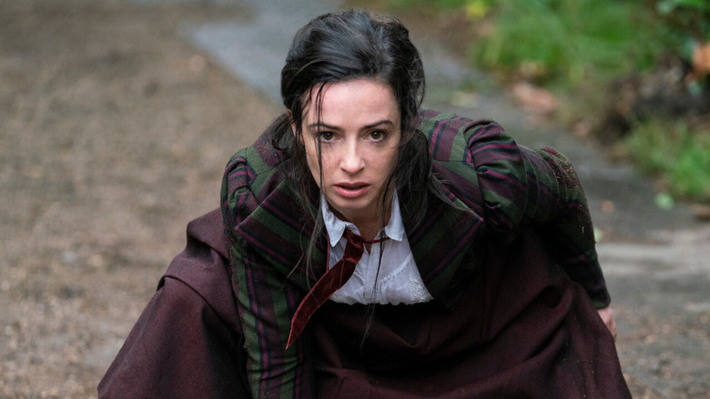 Laura Donnelly as Amelia True kneeling in the nevers