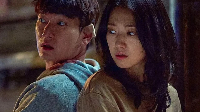Han Tae-sul (Cho Seung-won) and Kang Seo-hae (Park Shin-hye) are back-to-back in Sisyphus: The Myth