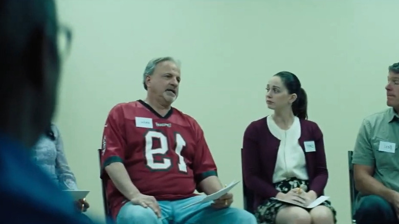 Man in red jersey speaking in Vice