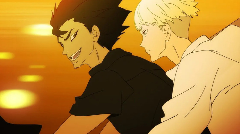 Akira Fudo and Ryo Asuka ride on a motorcycle together in Devilman Crybaby