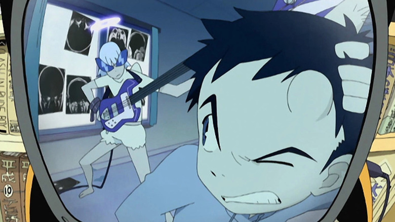 Naota glares at Haruko playing guitar in a mirror in FLCL
