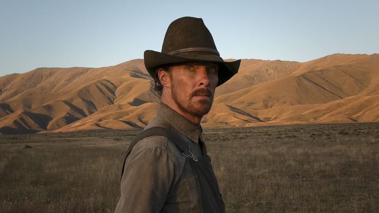 Phil Burbank overalls and a cowboy hat