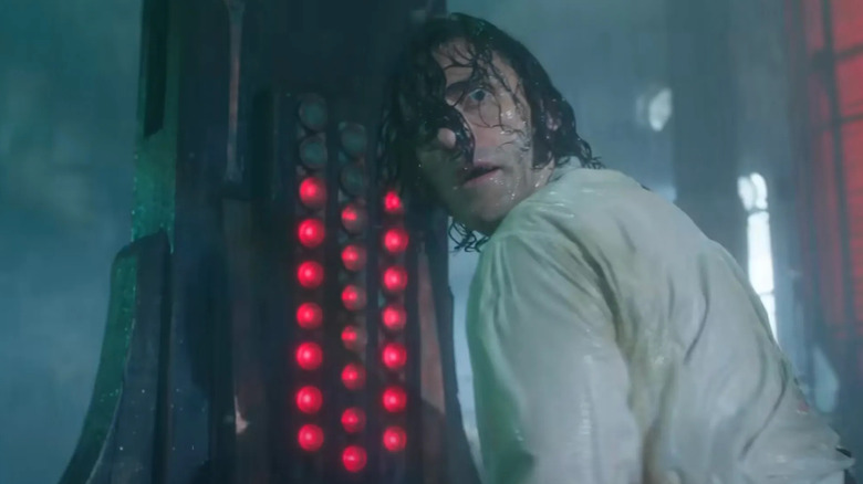 Oscar Isaac as Victor Frankenstein in the rain in Frankenstein