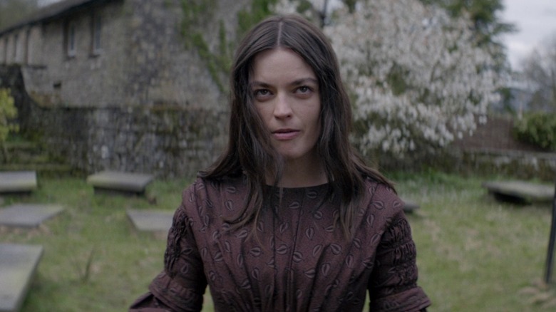 Emily Brontë (Emma Mackey) glowers in Emily