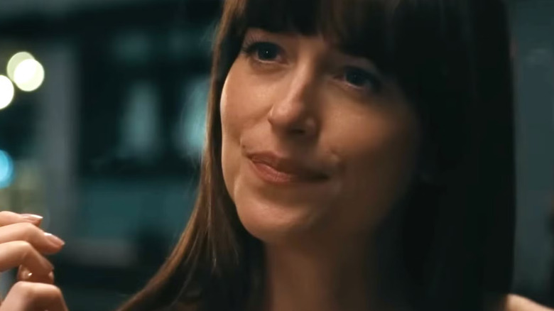 Lucy Mason (Dakota Johnson) smiling in Materialists