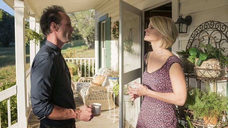 Walton Goggins Joelle Carter outside porch