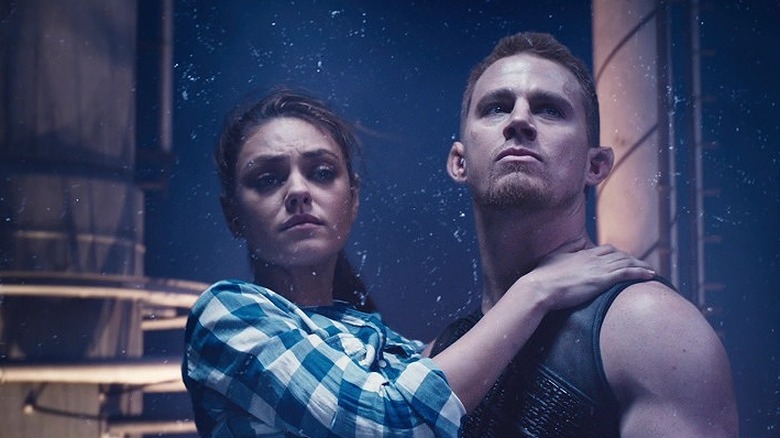 Mila Kunis hangs on to Channing Tatum sleeveless shirt