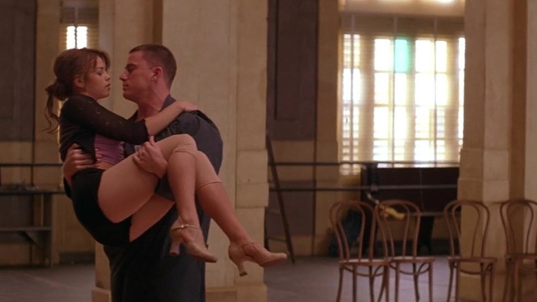 Channing Tatum holds Jenna Dewan in his arms Step Up