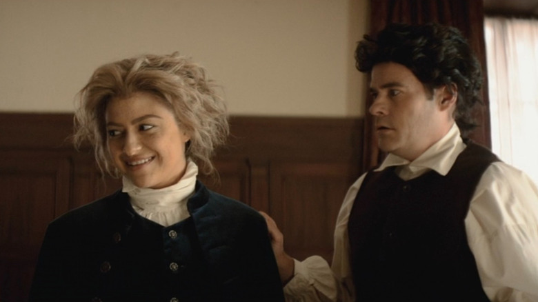 Alexander Hamilton (Alia Shawkat) smiling next to man (Bennie Arthur) on Drunk History
