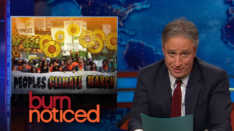 Jon Stewart looking at the camera on The Daily Show