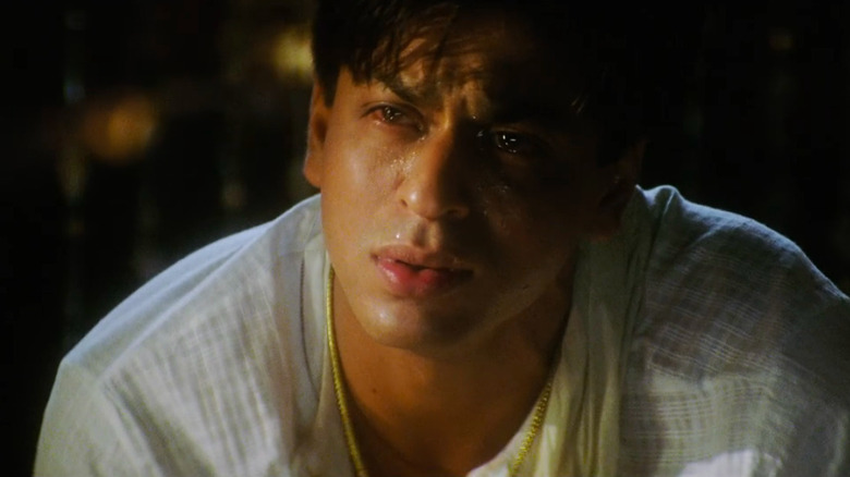 Shah Rukh Khan as Devdas crying close-up in white clothing