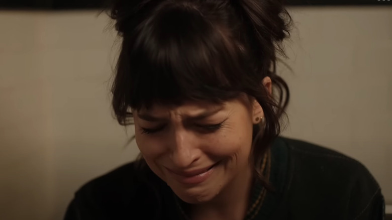 Lucy (Dakota Johnson) crying in Am I OK?