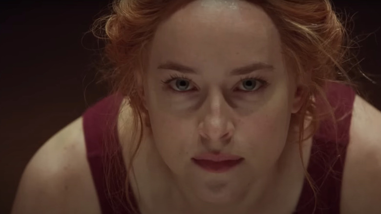 Susie (Dakota Johnson) dancing intensely in Suspiria