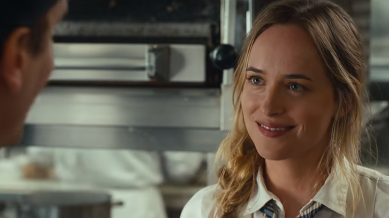 Audrey (Dakota Johnson) smiling in The Five-Year Engagement
