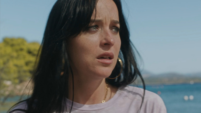 Nina (Dakota Johnson) worried in The Lost Daughter