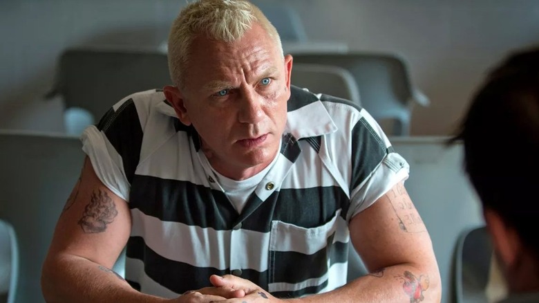 Daniel Craig in Logan Lucky looking sternly at someone off screen