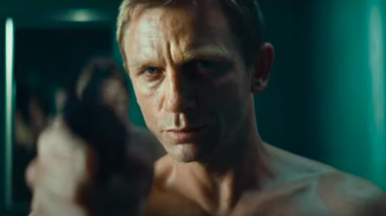 Daniel Craig in Layer Cake aiming gun