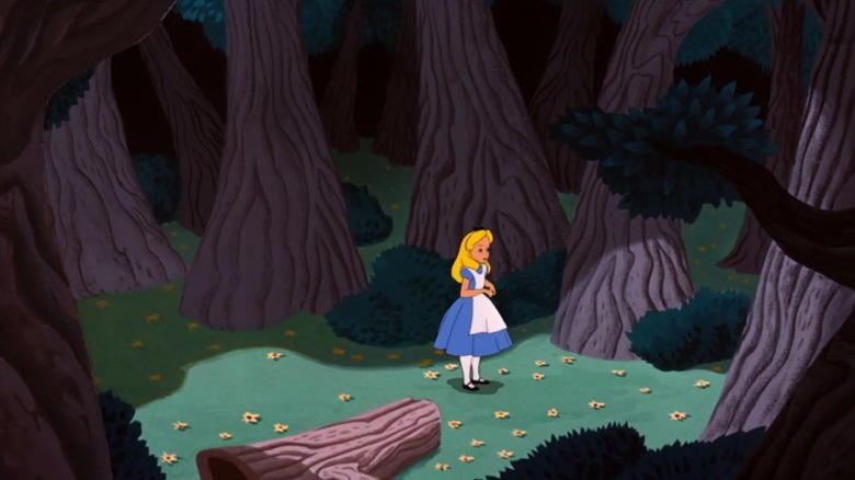 Alice standing in the middle of the forest in Alice in Wonderland