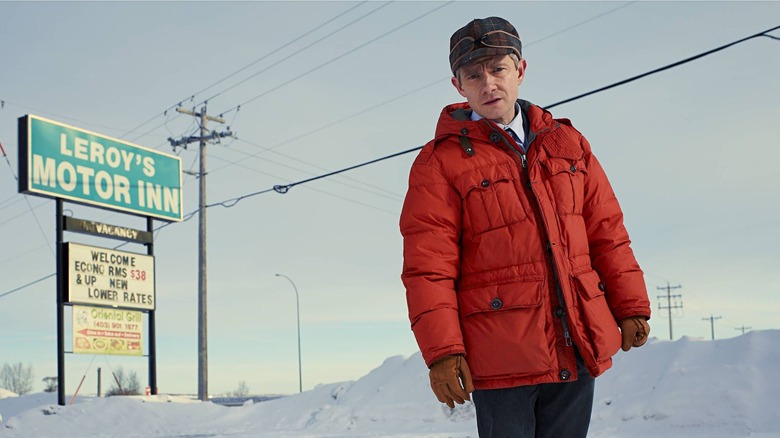 Martin Freeman standing in snow