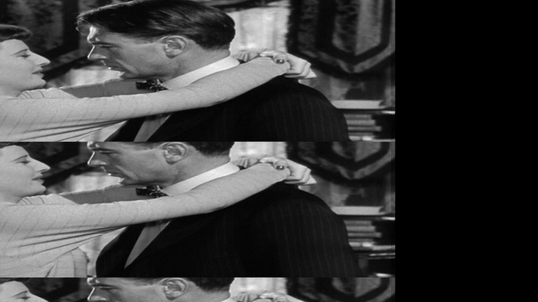 Sugarpuss (Barbara Stanwyck) and Pottsy (Gary Cooper) embracing in Ball of Fire