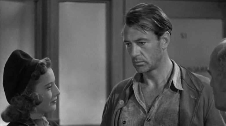 Ann (Barbara Stanwyck) hiring John (Gary Cooper) to play John Doe in Meet John Doe