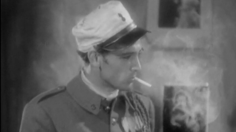 Gary Cooper as Tom smoking in Morocco