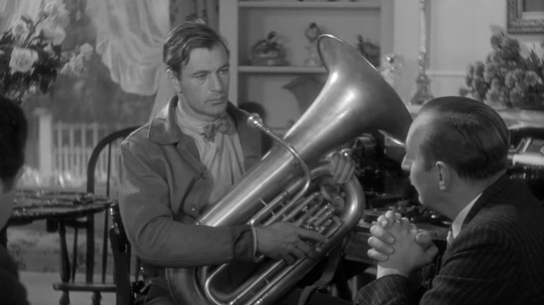 Longfellow Deeds holding tuba in Mr Deeds Goes to Town
