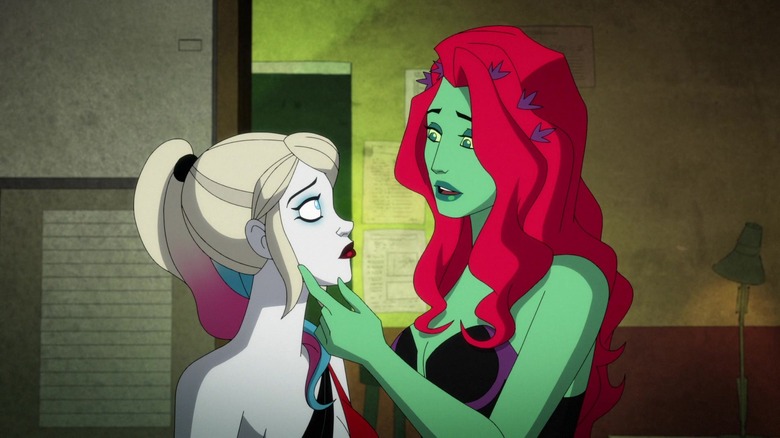 Harley Quinn's Ivy touching Harley's chin 