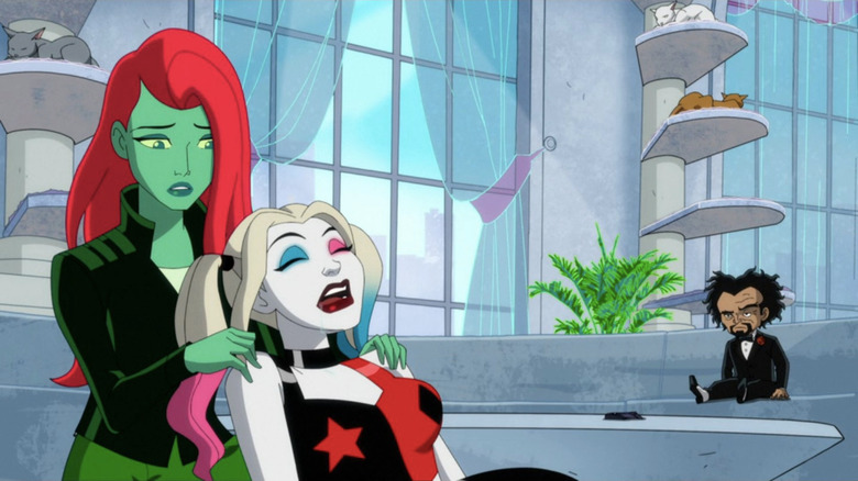 Harley Quinn's Ivy holding unconscious Harley in her lap