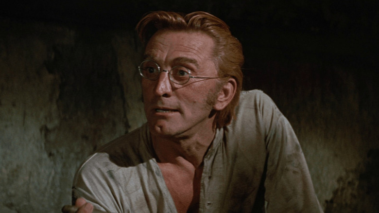 Paris Pitman (Kirk Douglas) in a cave in There Was A Crooked Man