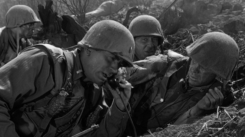 Joe Clemons (Gregory Peck) gets on a combat radio in Pork Chop Hill