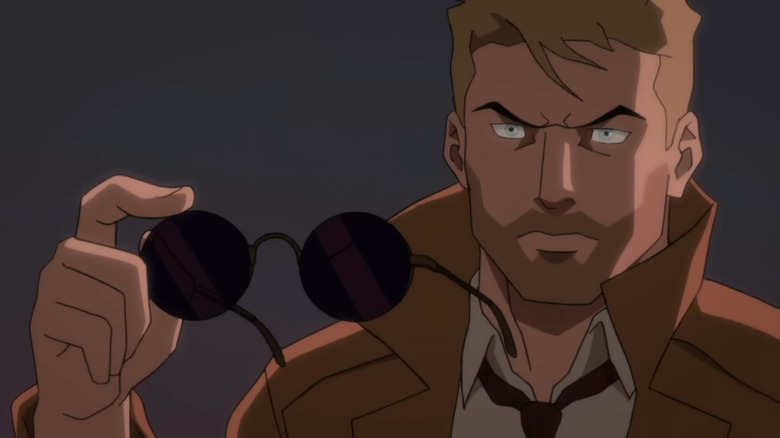 John Constantine holding glasses in Justice League Dark