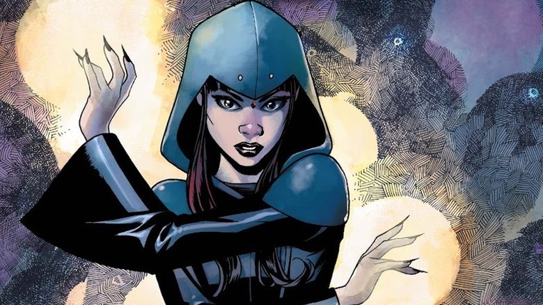 Raven wearing her iconic blue hood against purple cross-stitching on a DC comics cover