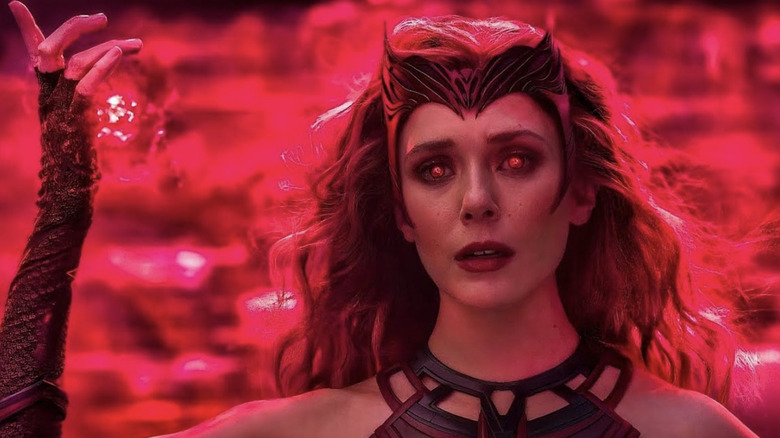 Elizabeth Olsen as Wanda casting a crimson spell in WandaVision