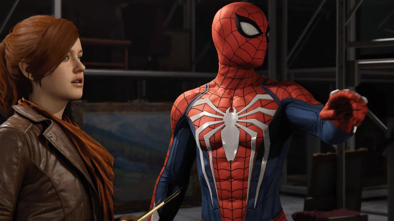 Spider-Man (Yuri Lowenthal) stands next to Mary Jane Watson (Laura Bailey) in Marvel's Spider-Man