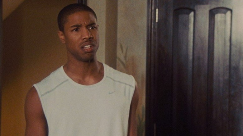 Michael B. Jordan scowl doorframe