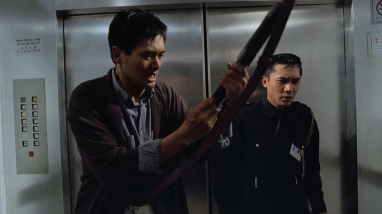 Tequila (Chow Yun-fat) and Alan (Tony Leung Chiu-wai) in an elevator in Hard Boiled