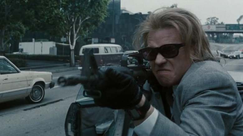 Chris Shiherlis (Val Kilmer) firing his gun in Heat