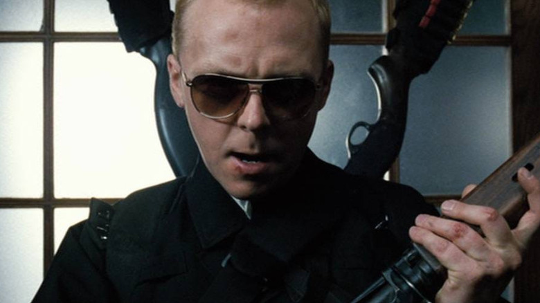 Nicholas Angel (Simon Pegg) loaded up in Hot Fuzz