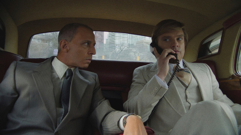 Roy Cohn (Jeremy Strong) strong arms Donald Trump (Sebastian Stan) in The Apprentice