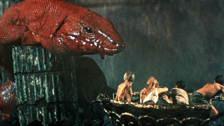 People are attacked by a giant red lizard in Journey To The Center of the Earth