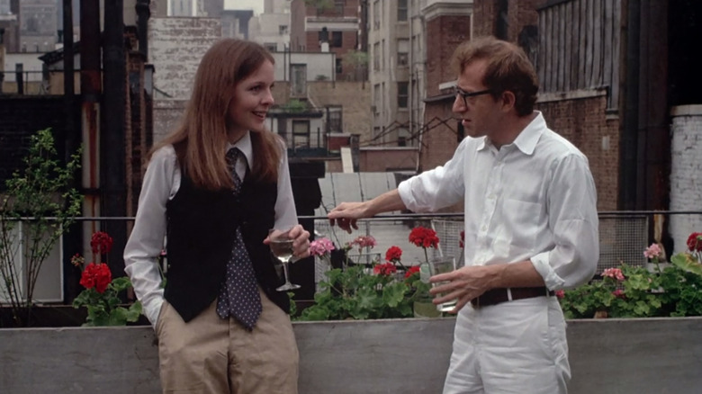 Annie Hall (Diane Keaton) and Alvy Singer (Woody Allen) share drinks on a terrace in Annie Hall