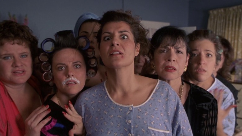 Women standing around Toula in My Big Fat Greek Wedding