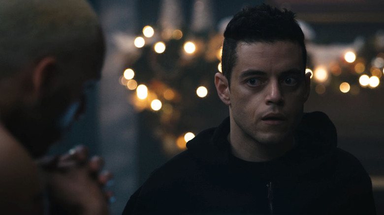 Elliot standing at Vera