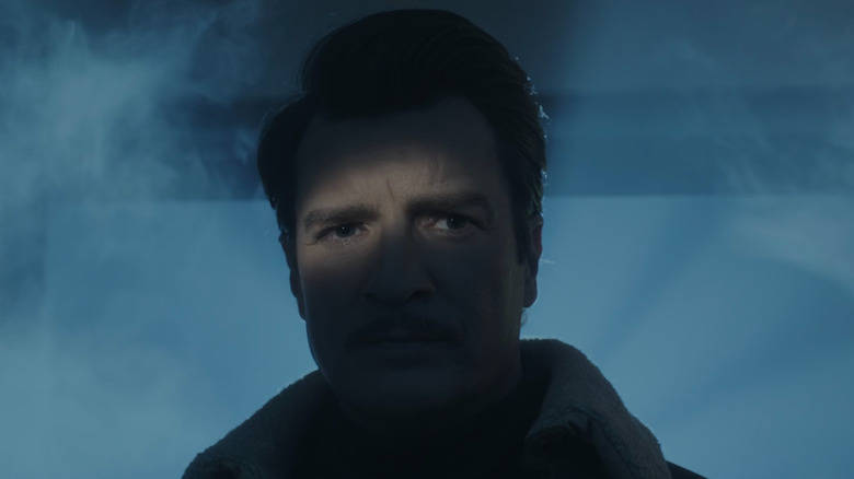 Jacques Snicket (Nathan Fillion) shrouded in shadow in A Series of Unfortunate Events
