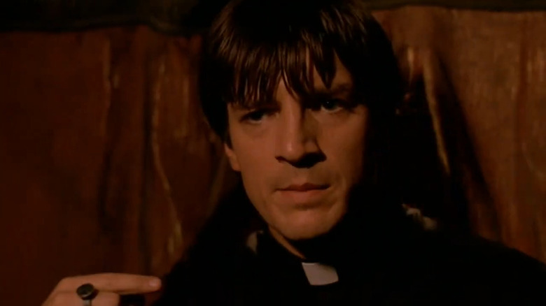 Caleb (Nathan Fillion) in a catacomb on Buffy the Vampire Slayer