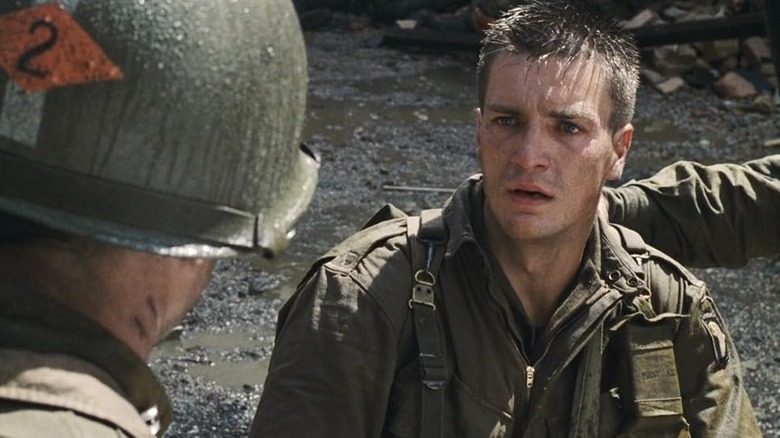 James Frederick Ryan (Nathan Fillion) looking shell-shocked in Saving Private Ryan