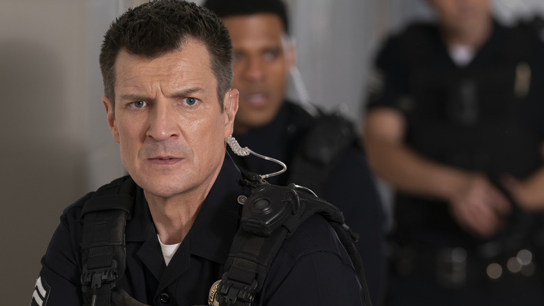 John Nolan (Nathan Fillion) leading a police unit on The Rookie